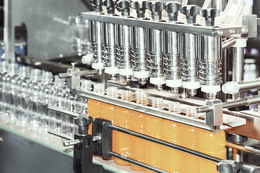 Bottles being filled on an assembly line